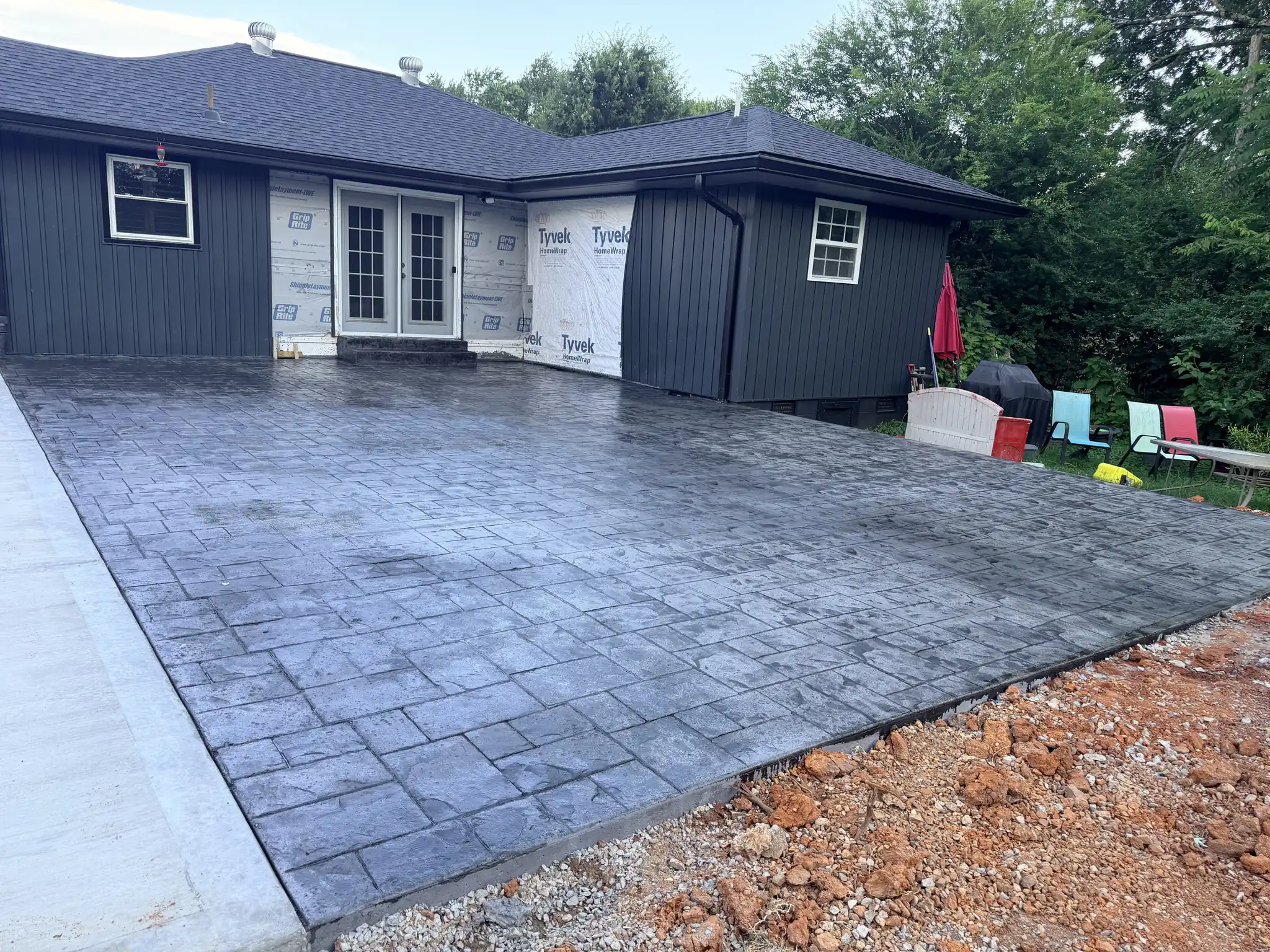 Large stamped concrete patio finished at a modern home in Knoxville, Tennessee